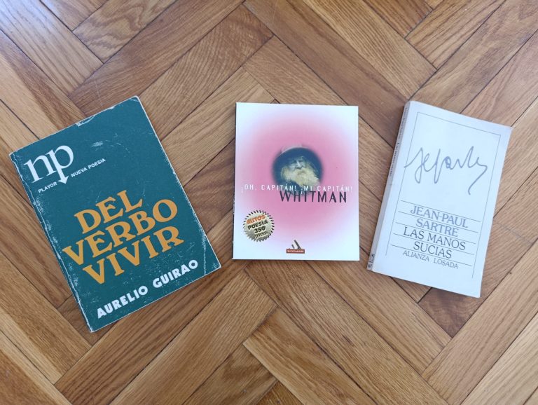 Cubiertas de los libros de Aurelio Guirao, Whitman y Sartre.